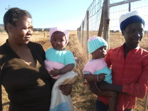 Giving out knitted jumpers and hats, thanks to the ladies in Australia