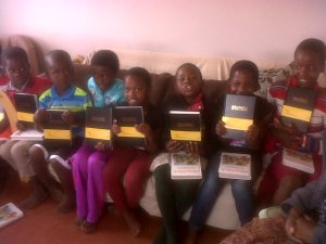 Kids recieving Bibles