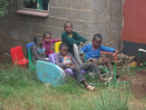 Kids in their imaginary Taxi