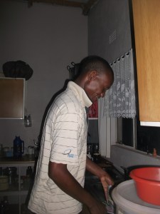 Phumlani doing dishes