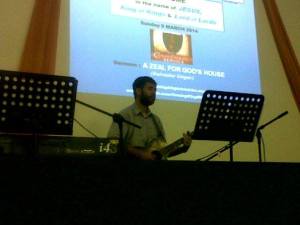 Salvador Singing at Coming King Ministries