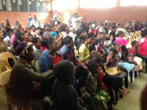 Parents watch their children at the Joyland creche end of year concert.