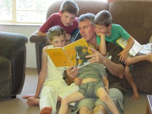Riaan reading to his kids