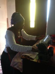 Celani using her sewing machine