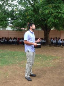 Salvador preaching at Care Bear Creche Concert