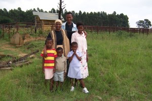 Khethiwe in 2004 when she attended kids club. She is standing on the right of her mother Celani.