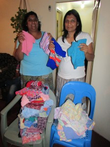 Giving out jumpers to bible study members in Stanger