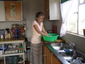 Di doing washing.
