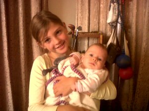 Bianca's sister, Naomi, holding little Esther.