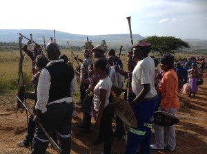 The men at the Zulu wedding waiting to come into the homestead