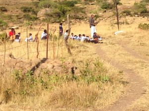 Phumlani preaches to a small crowd of young people