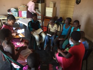 Khethiwe teaches the older kids at kid's club