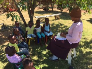 Celani teaches the younger kids at kids club